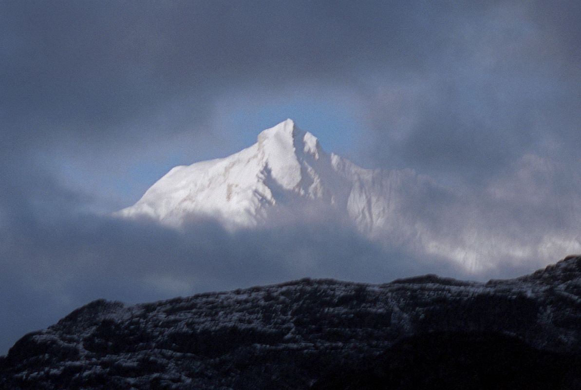 15 Chomolonzo Pokes Out From The Clouds From Camp Below Shao La Tibet